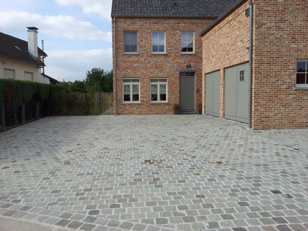 oprit-laten-bestraten