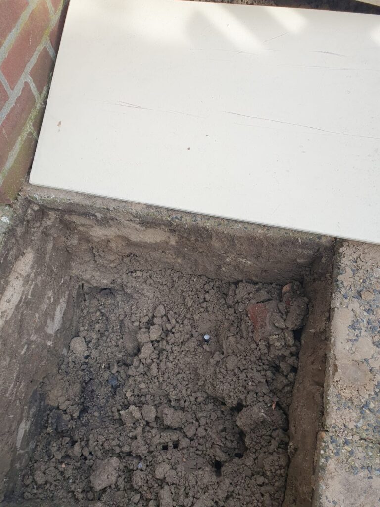 Grond afvoeren van tuin afgraven voor speciale leidingen